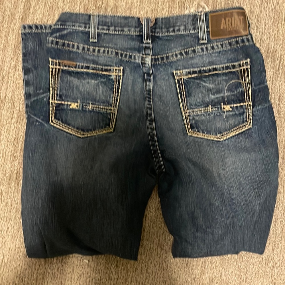 ARIAT M5 36x32 jeans. Some wear on cuffs.